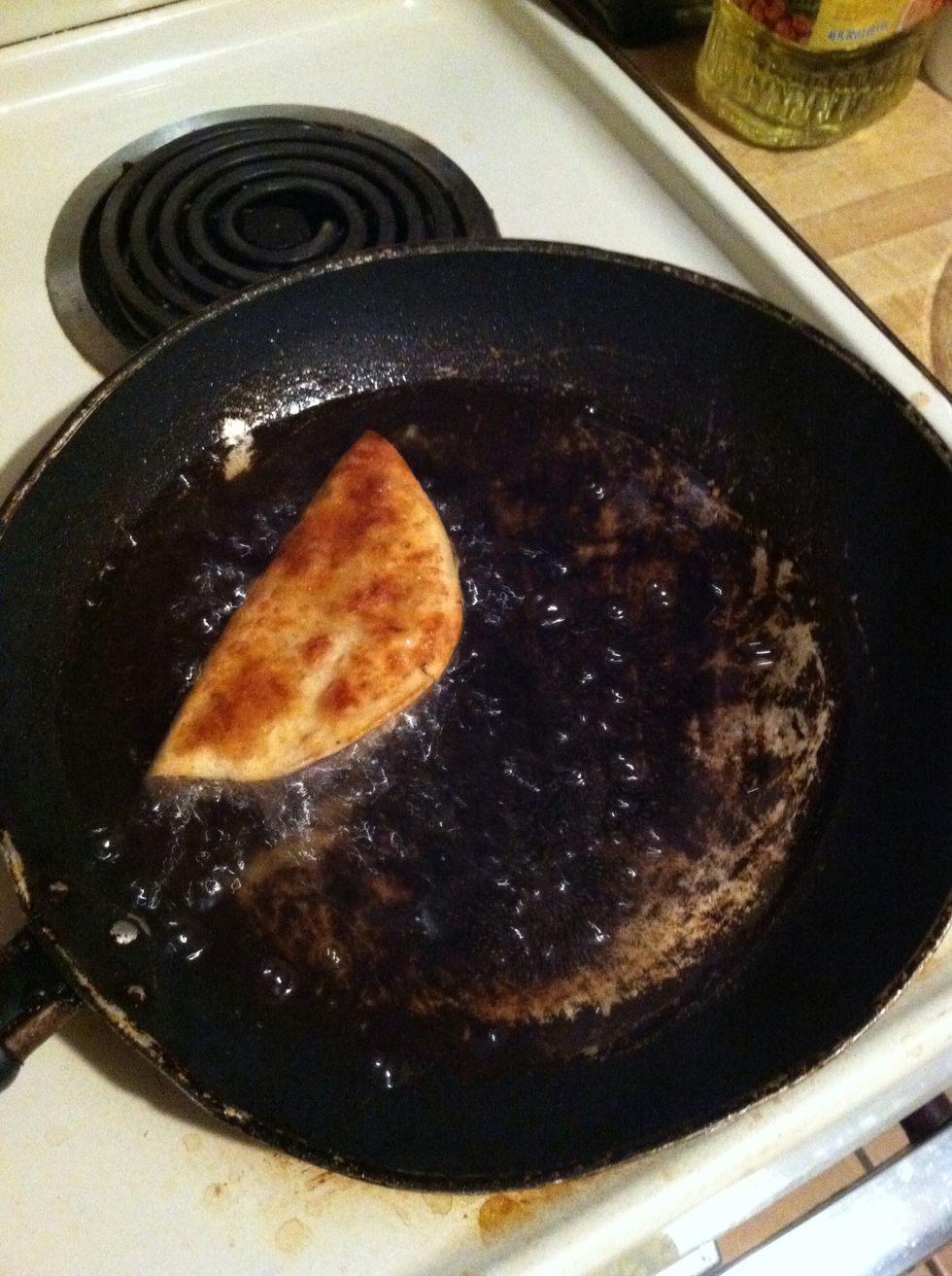 When it gets nice and golden brown turn it over to fry the other side.