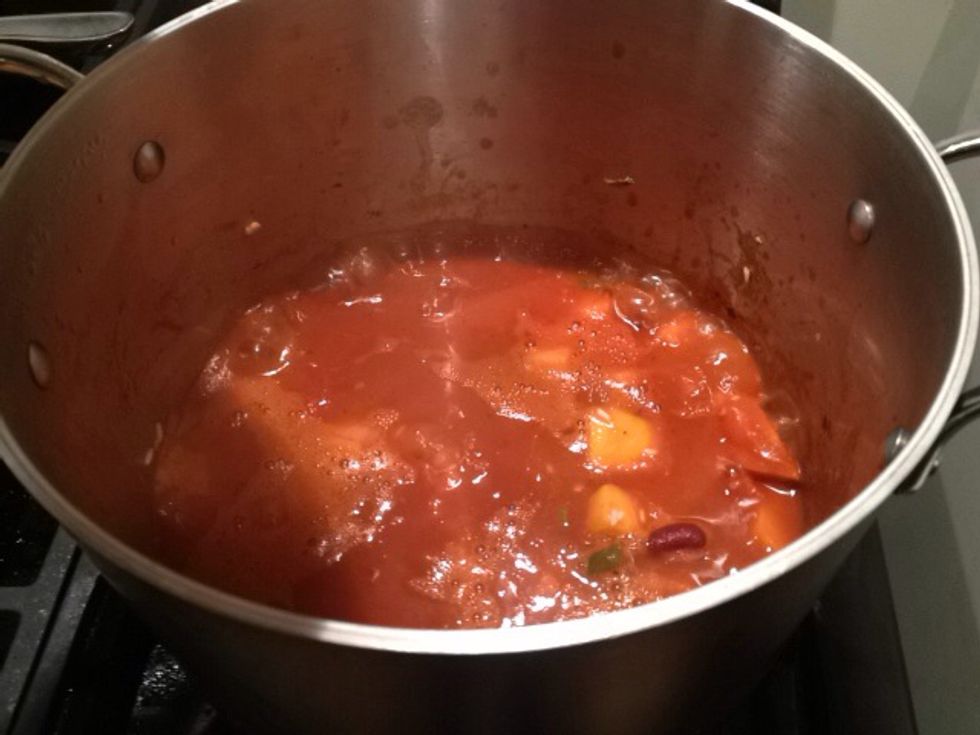 When it has reached a boil, lower to a simmer. Continue cooking, covered, for about 20 minutes. It is done when the rice is cooked through.