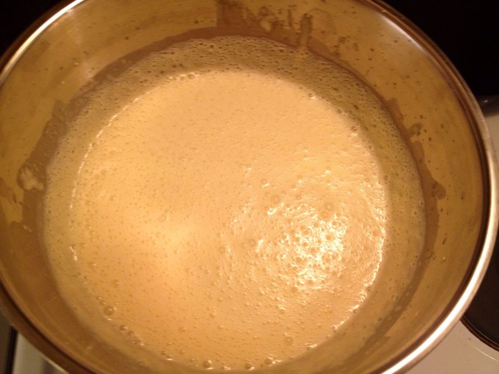 When it has the right texture, pour it into another container.