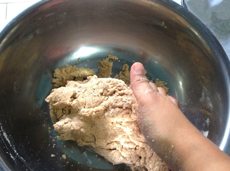 When it is hard enough to stir, simply use your hands! :) slowly knead and roll the dough into 3/4 inch. Cut the dough into 10-12. Or again :) just like me :) simply make small balls right away