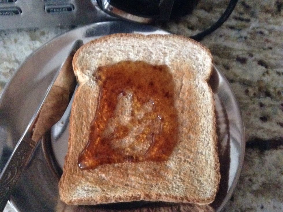 When it is ready and remember wait about one or two minutes for it to finish then but a spoon of syrup on the bread