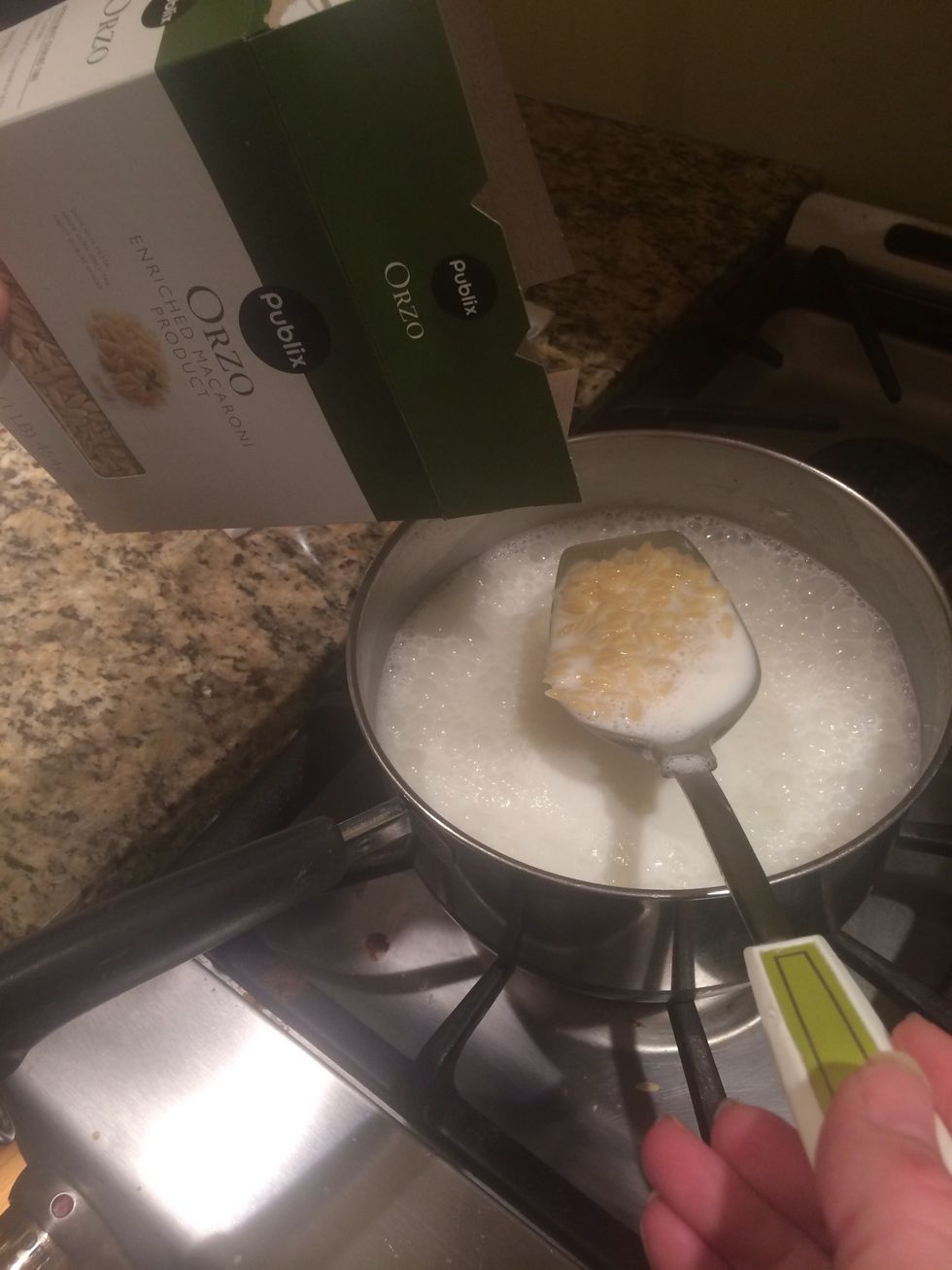When it's boiling add orzo.