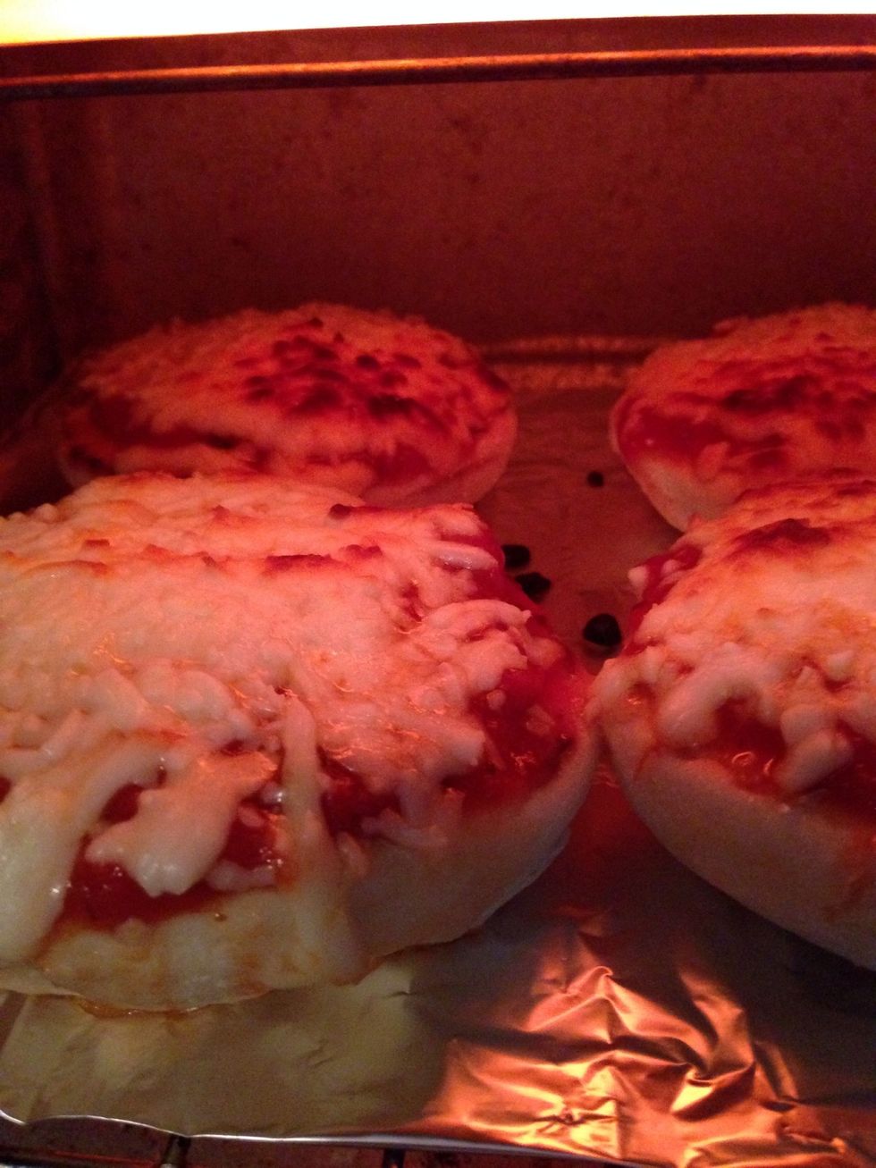 When it's browning on the top and all the cheese has melted, they are done.