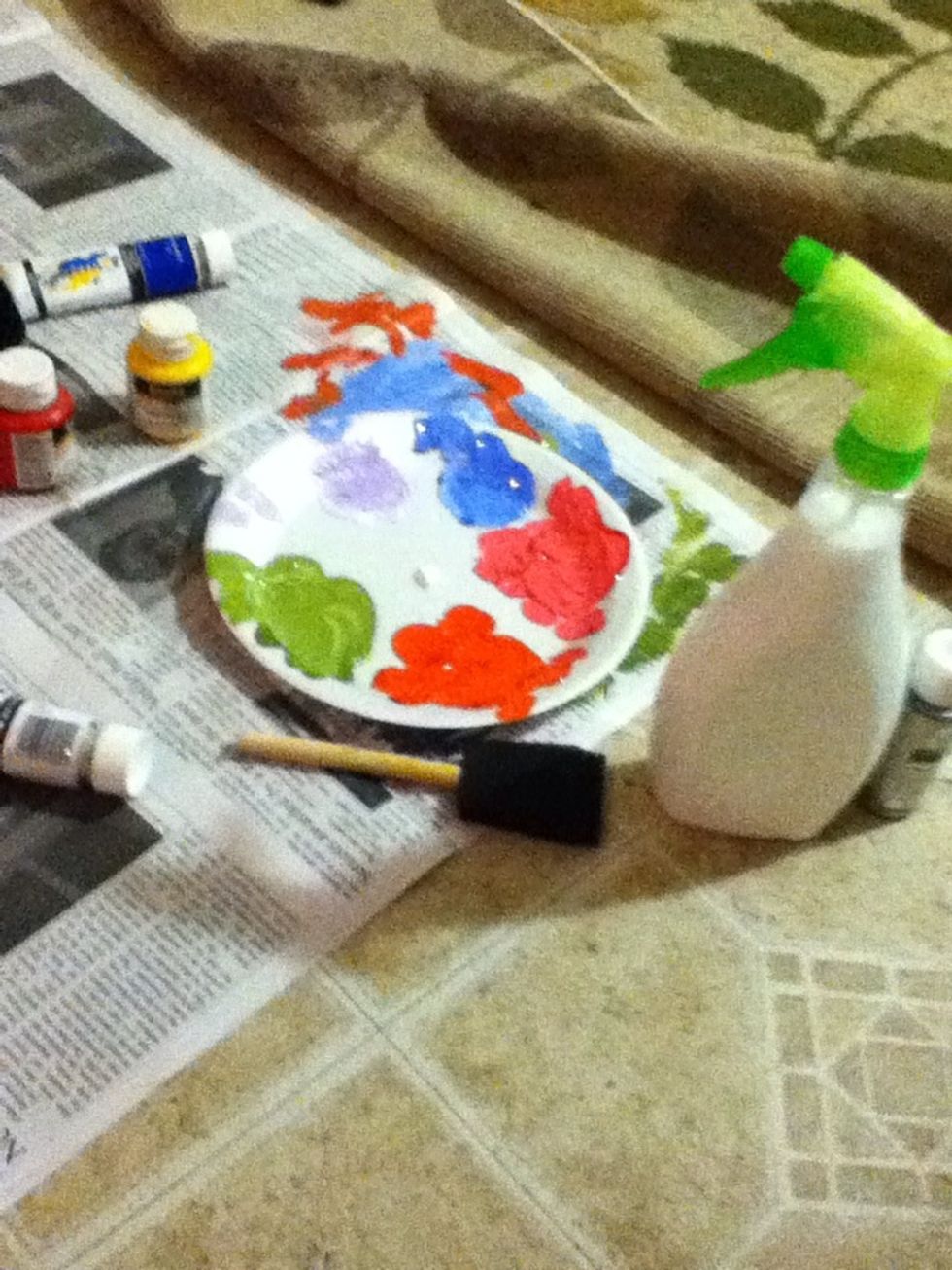 When it's close to being dry then get your colour palette together, I'm using orange, pink, blue, green, and purple ALWAYS HAVE WHITE PAINT