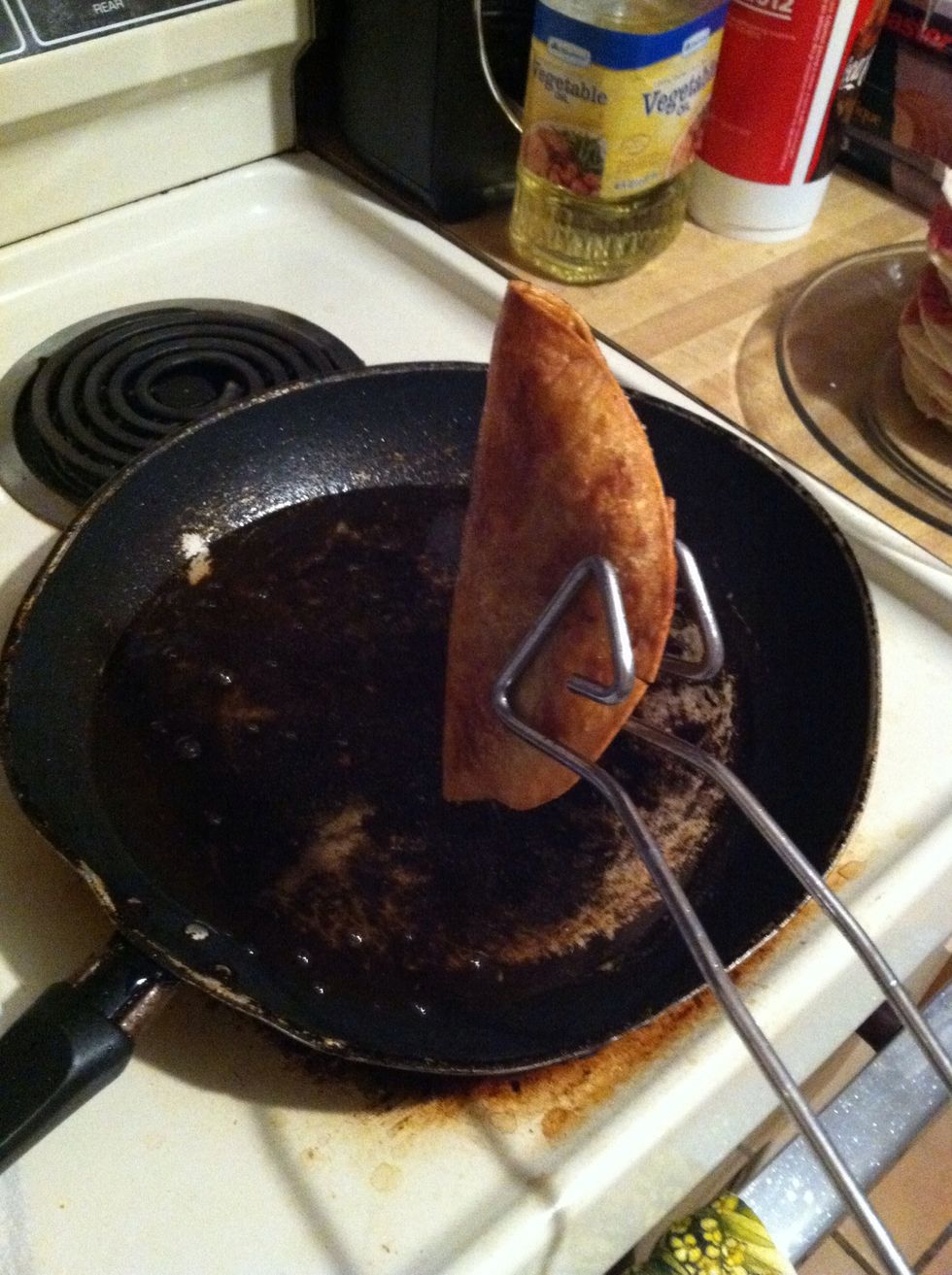 When it's done, drain the excess oil.