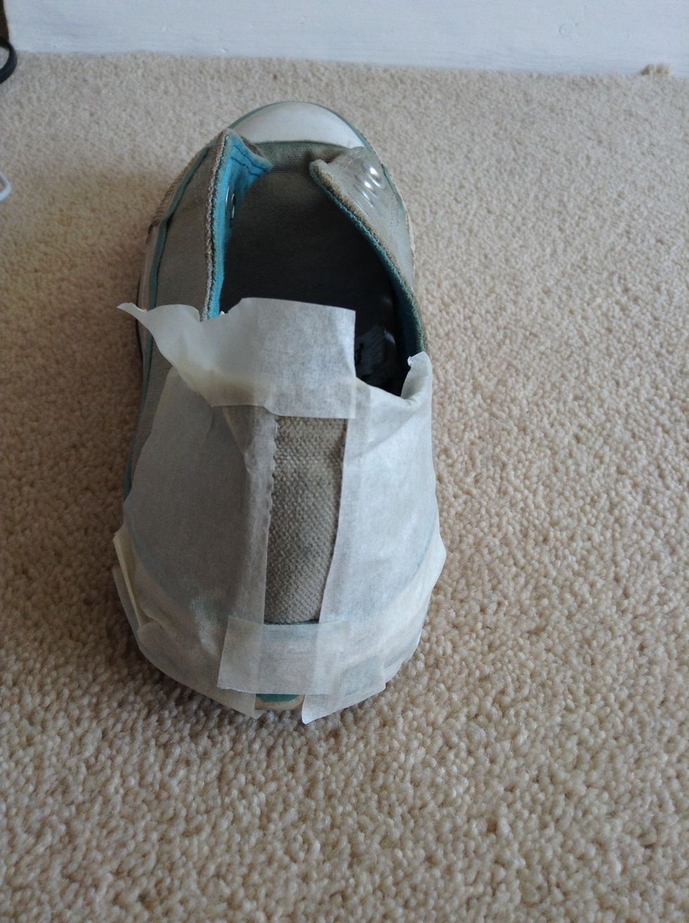 When it's dry start to put tape around the bit you are going to draw on first