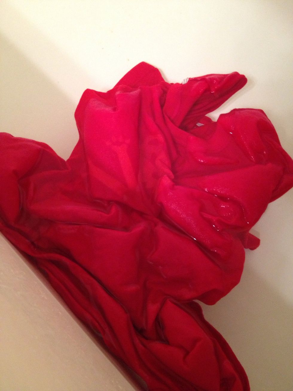 When it's reached your liking, throw it immediately in your prepared cold water\u2014stencil and all. Wring it out after it's thoroughly soaked.