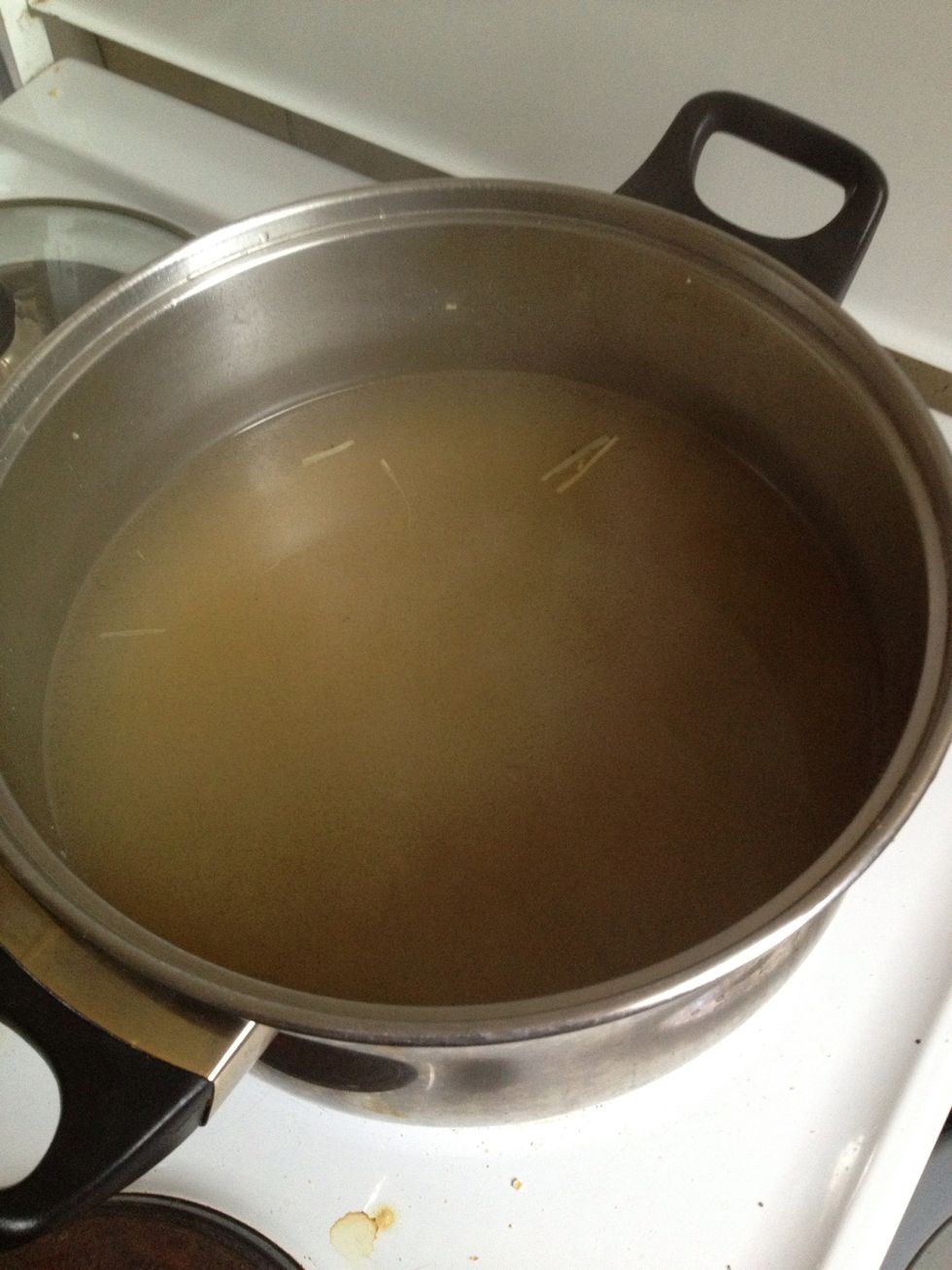 When it's simmered enough and all the flavours are infused in the broth, strain all the large pieces out.