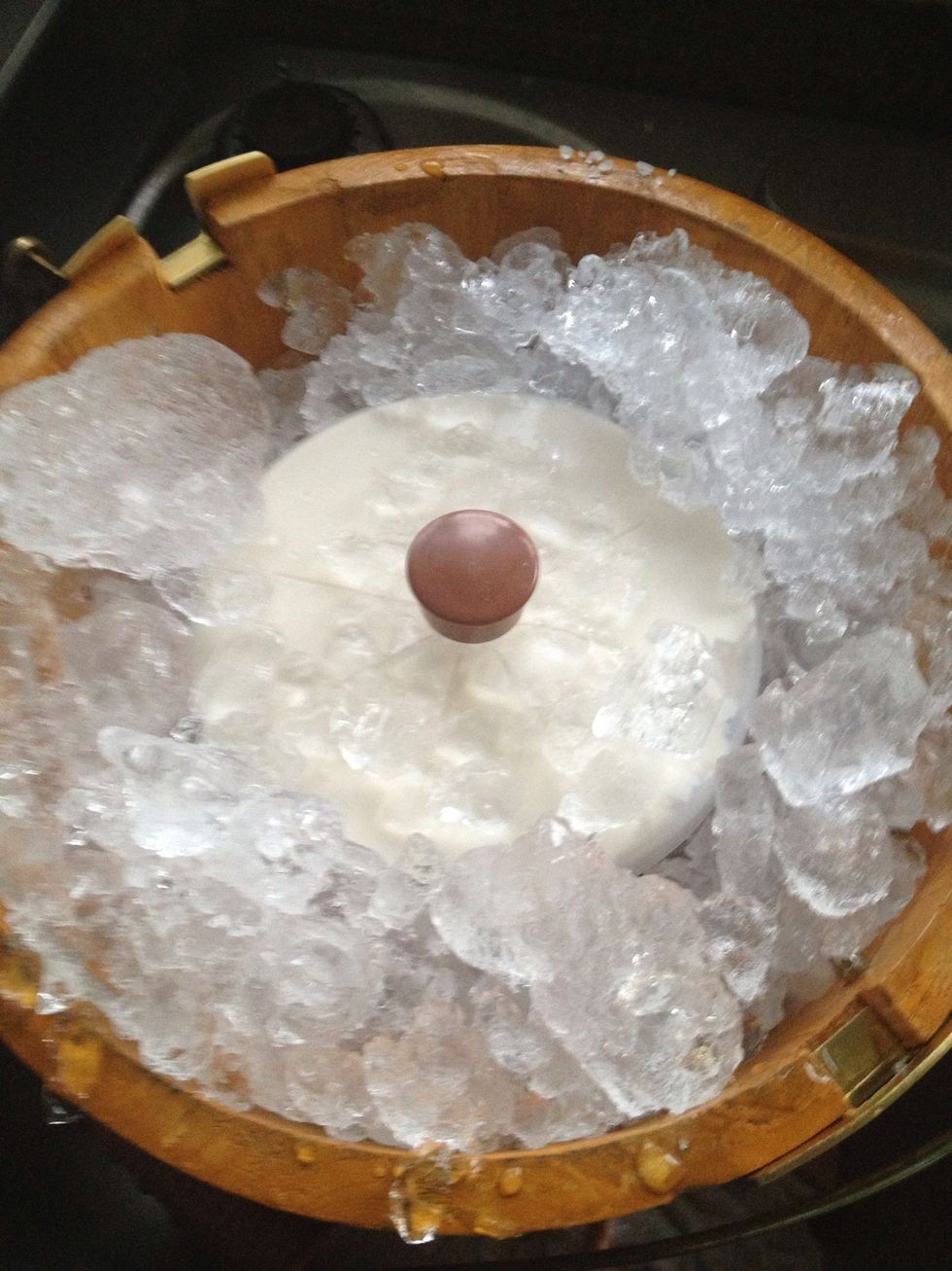 When it stops remove motor fill ice and salt to top cover with newspaper/bag for one hour to ripen or harden.