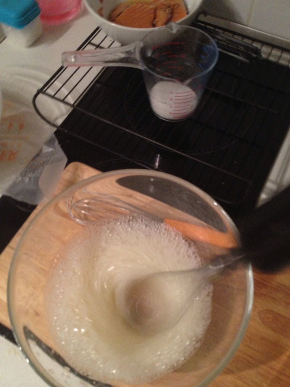 When its really foamy add a little bit of sugar at a time.