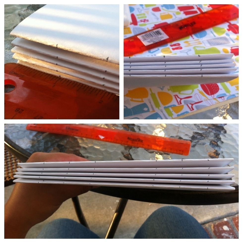 When marking where the holes will go, you should mark it an inch away from all sides. I did two sets of 3 marks on my pages