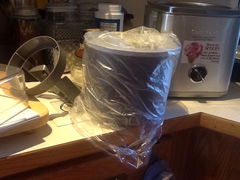 When mixture is chilled pull covered 2 quart freezer bowl out of freezer and uncover.
