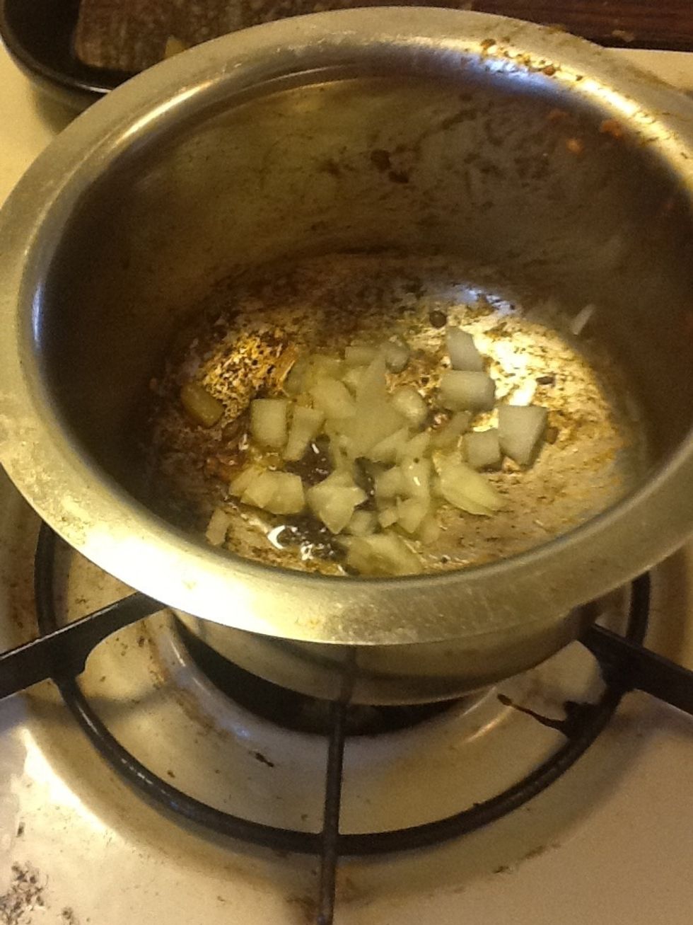 When mustard seeds start popping add onions
