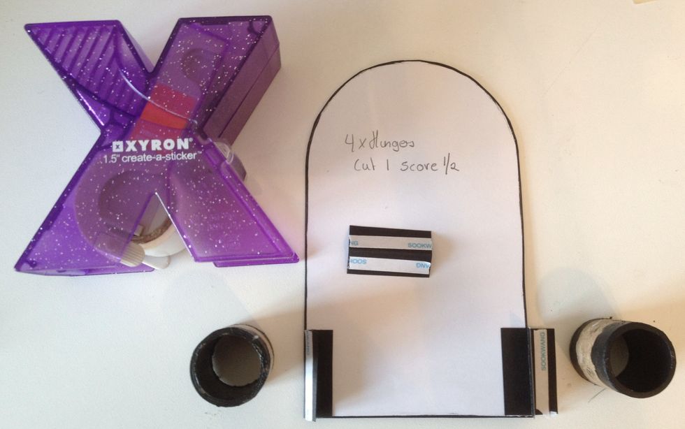 When my roll of Xyron is empty i save the rolls. Used 2 of the large on this set and painted the inside black.Glue hinges on both sides of the stand.