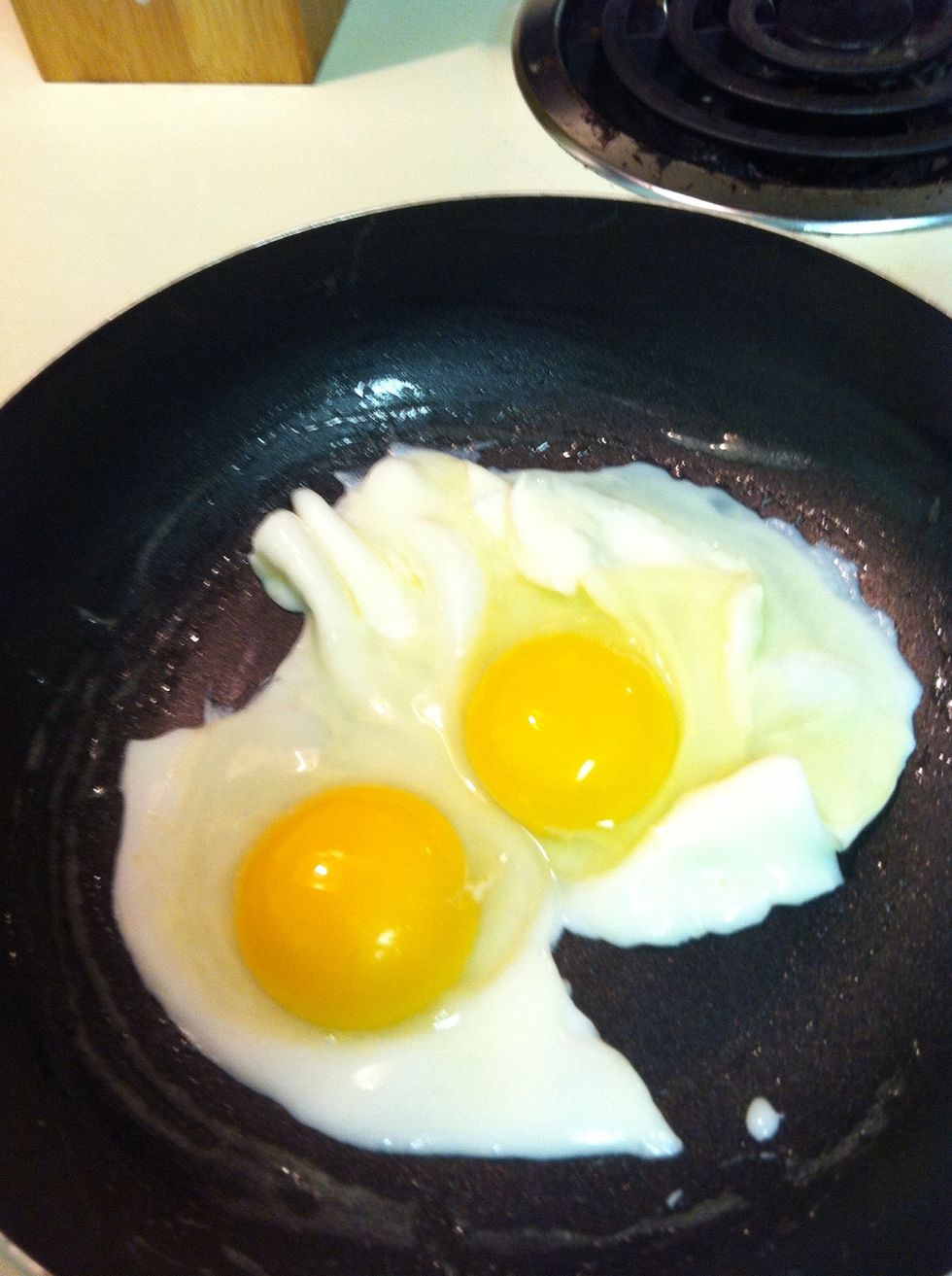 When no more white is running out its time to flip them! You could also leave them like this for sunny side up eggs. Although these aren't very pretty lol.