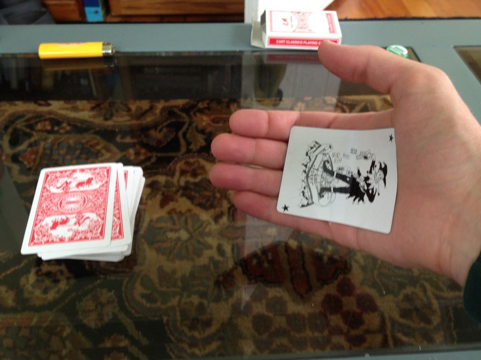 When no one is looking, "palm" a card. This is the most difficult part to explain. I am not a professional magician, so by all means consult one if this seems stupid... Just hide it OK?