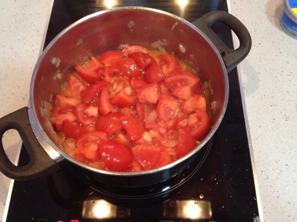 When onion is a little fried, put the tomatoes