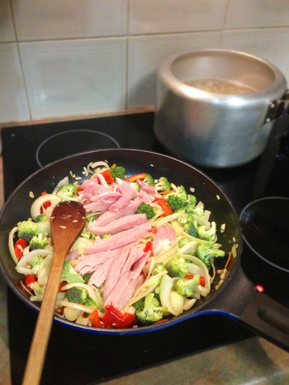 When onion is softened put in bacon, broccoli.