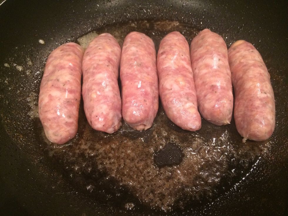 When pan hot and butter bubbling, add sausages