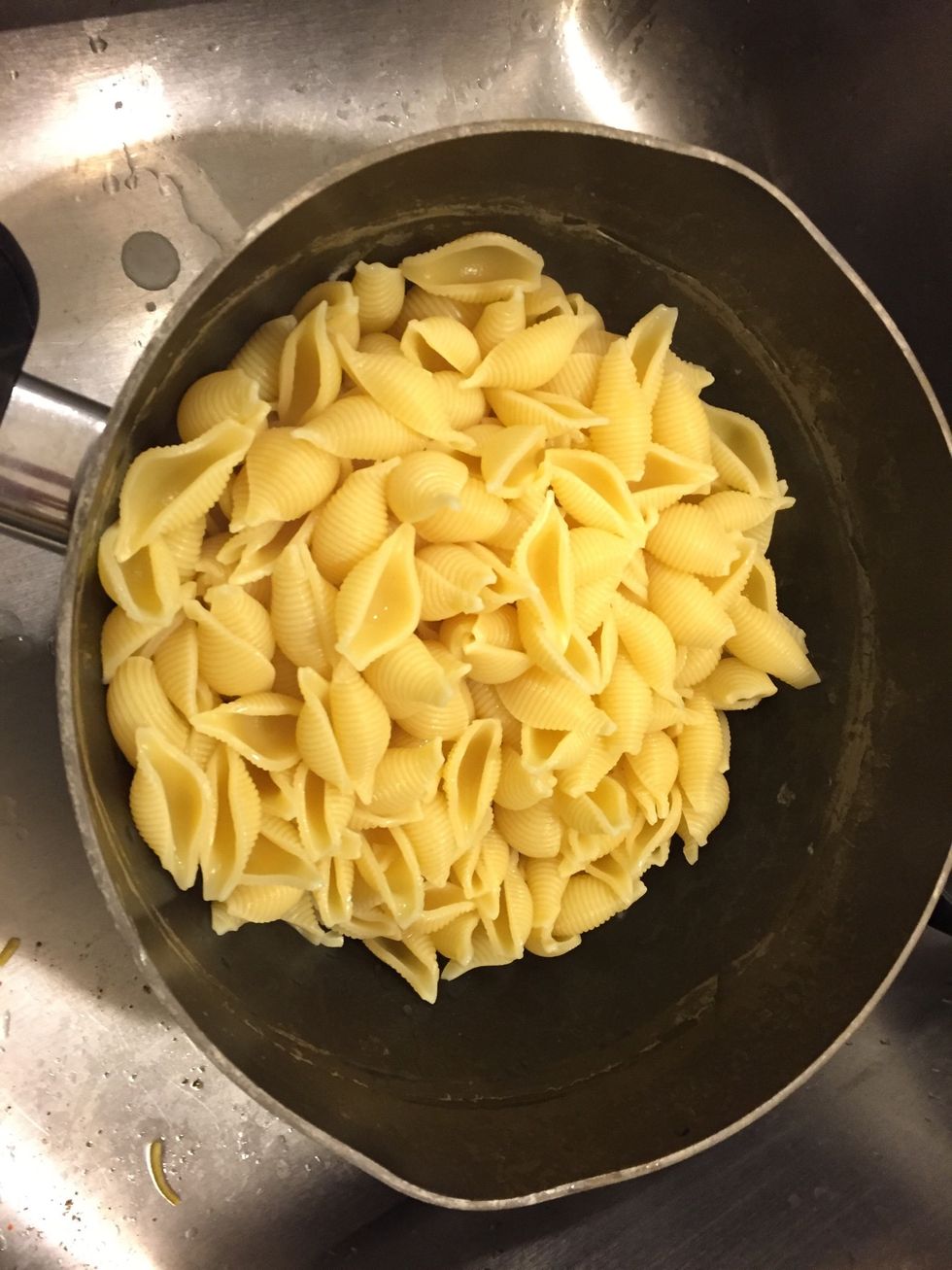 When pasta is cooked, strain.. Obviously.