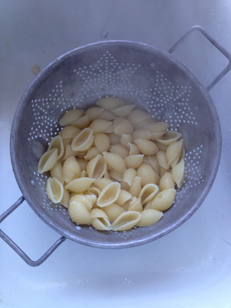 When pasta is done drain out the water.