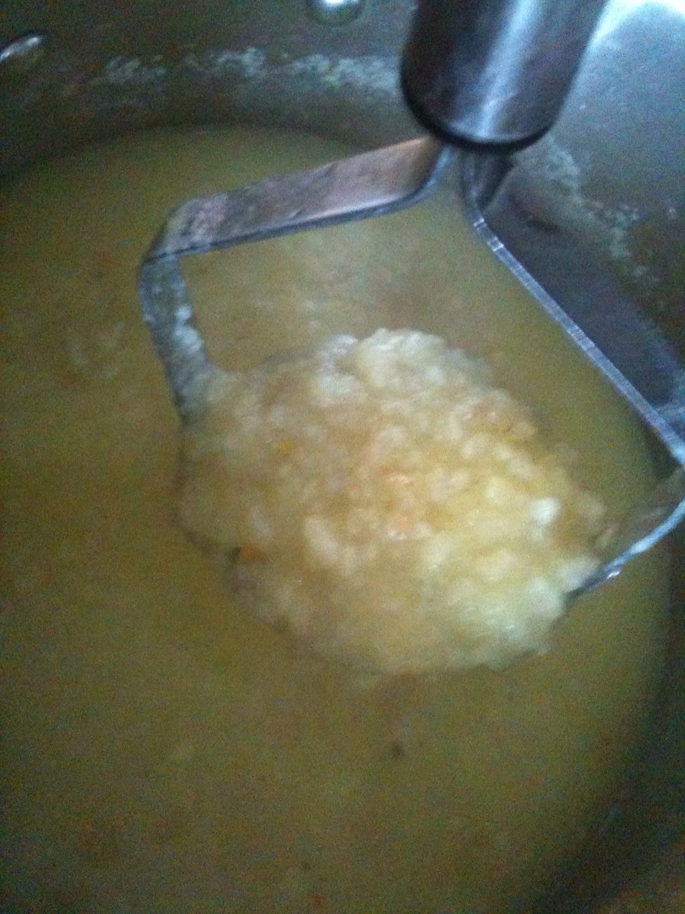 When potatoes are done, mash them!