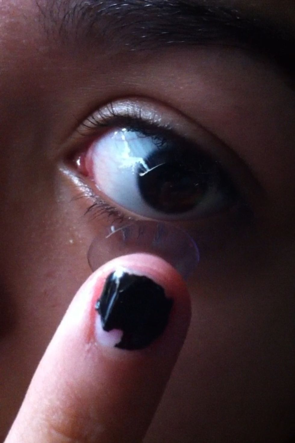 When putting on the contact, keep it on the tip of your finger to make it easier. If you have smaller eyes I suggest using your less dominant hand to prop open your eyelid as you lay it on