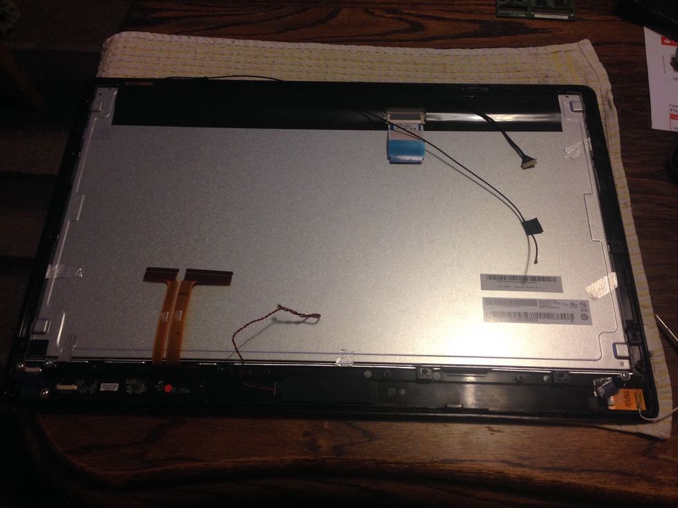 When putting the metal angle back on I used a fresh layer of double sided sticky tape. I had to bend them back into shape. Be extra careful with the touchscreen ribbon cable, do not damage it.