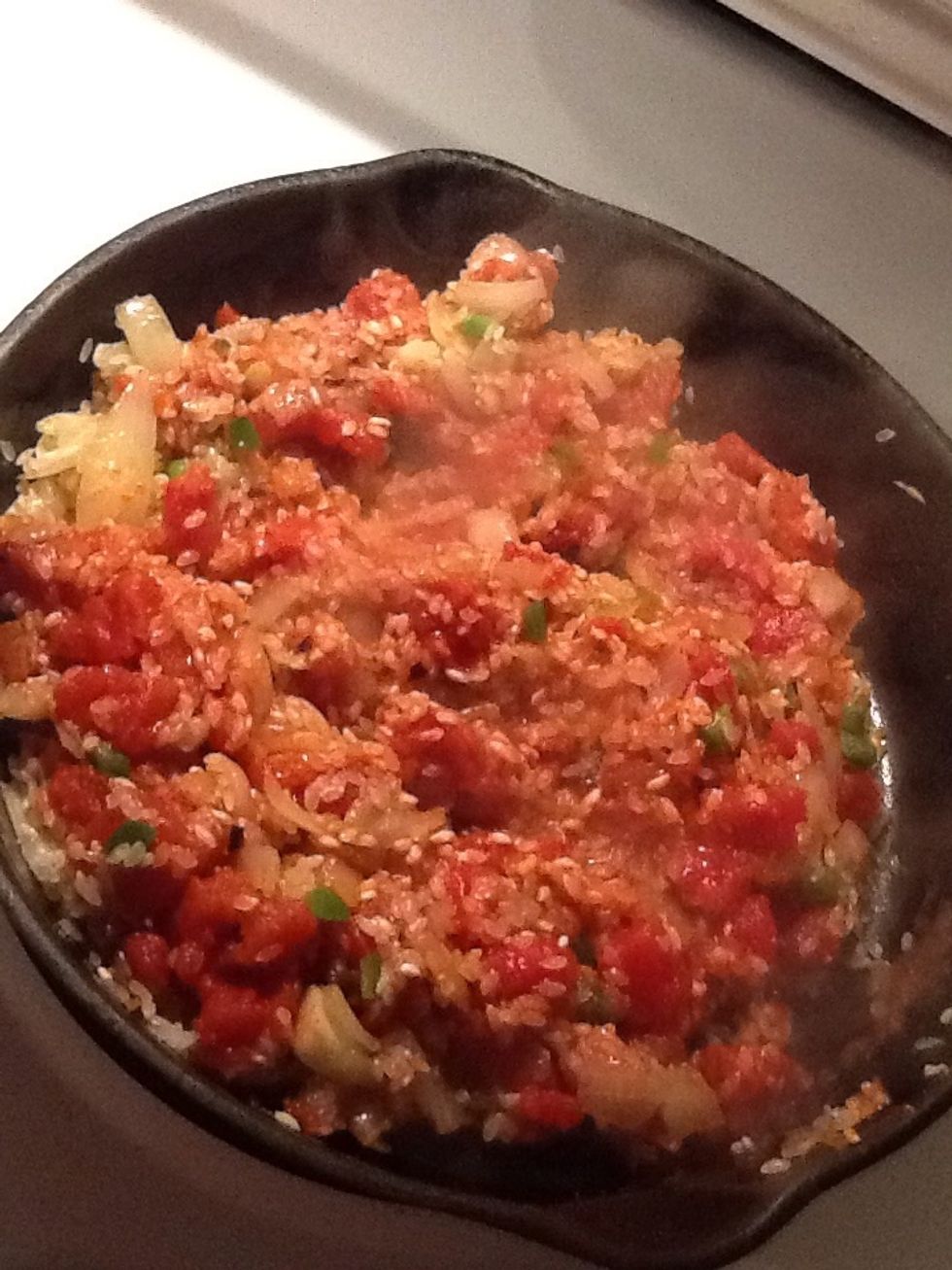 When ready, add your tomatoes(minus the juice) and mix. Cook 1-2 minutes longer to blend flavors. I chose tomatoes with chili flavors for a little spice.