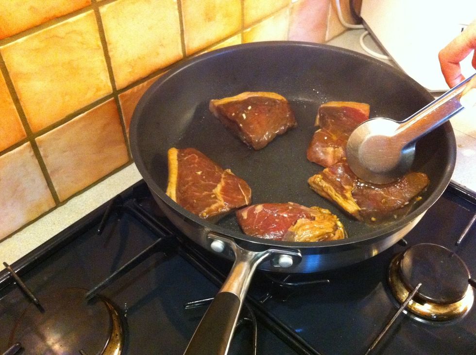 When ready.. place the steaks with the fat facing outwards into a well heated pan..