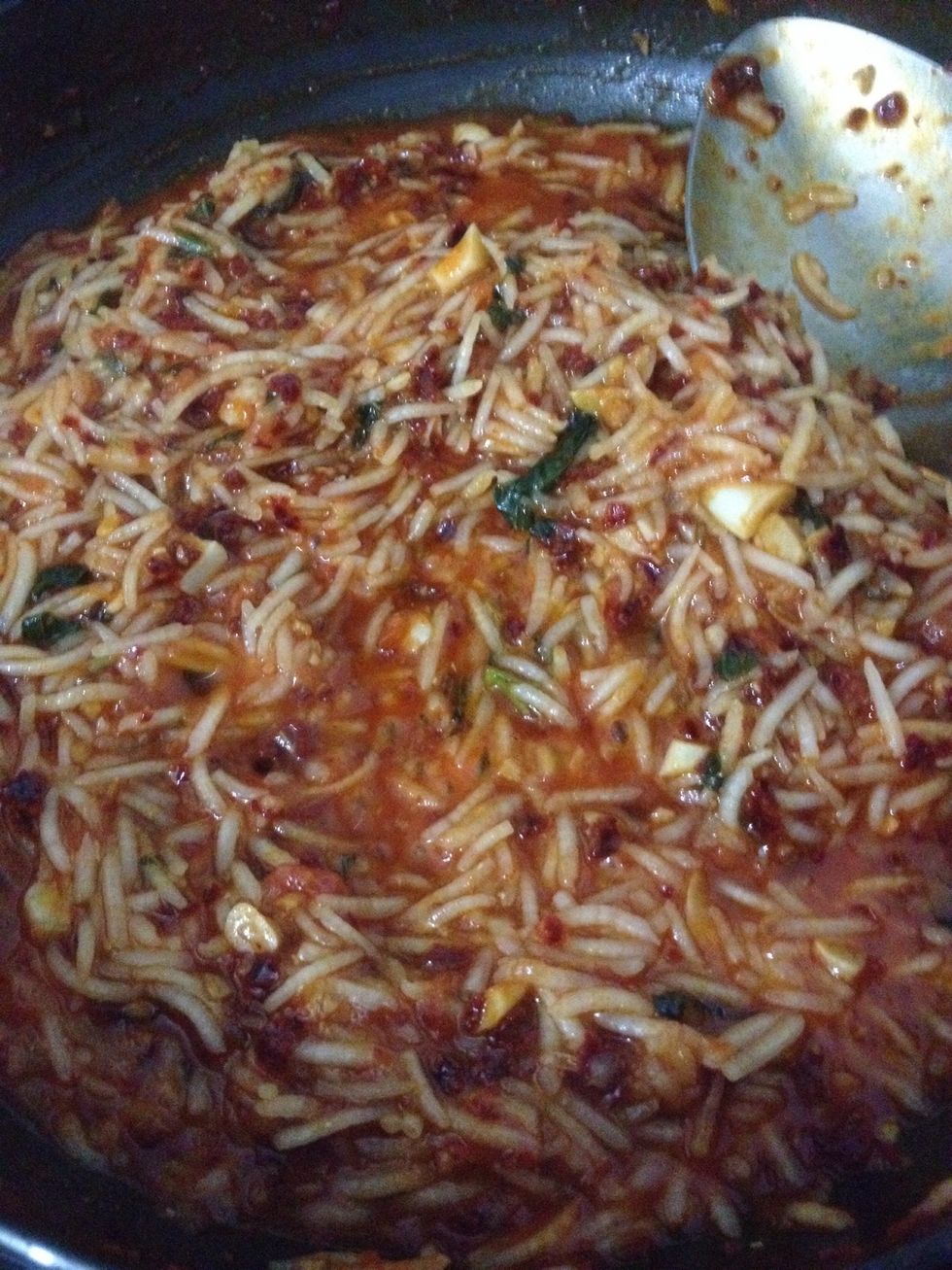 When rice almost done wait till moisture is lost