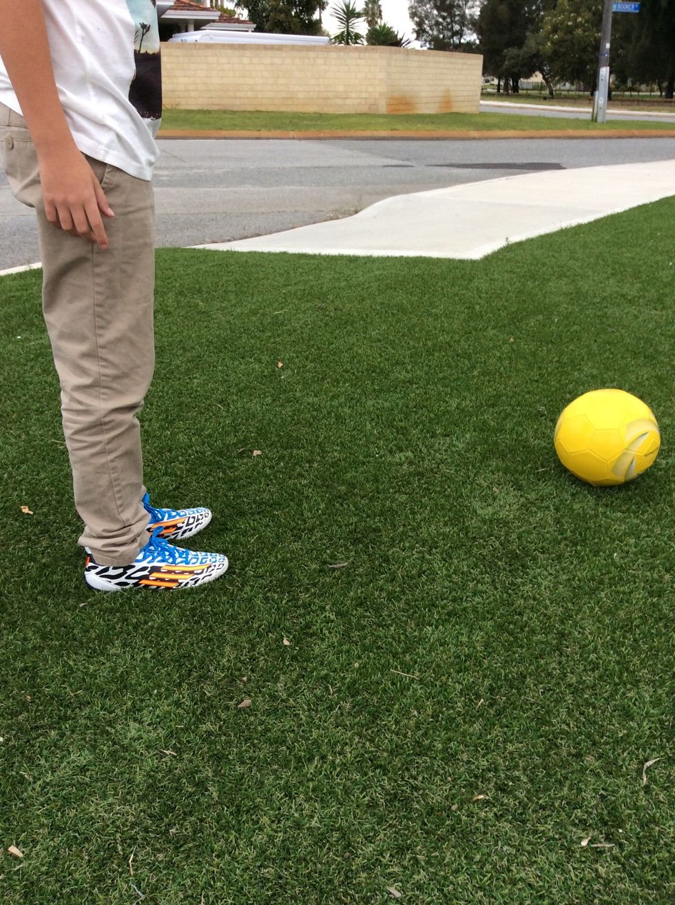 When shooting for a precise goal in soccer you will have to move back away from the ball two steps. You have to be diagonal from the ball.