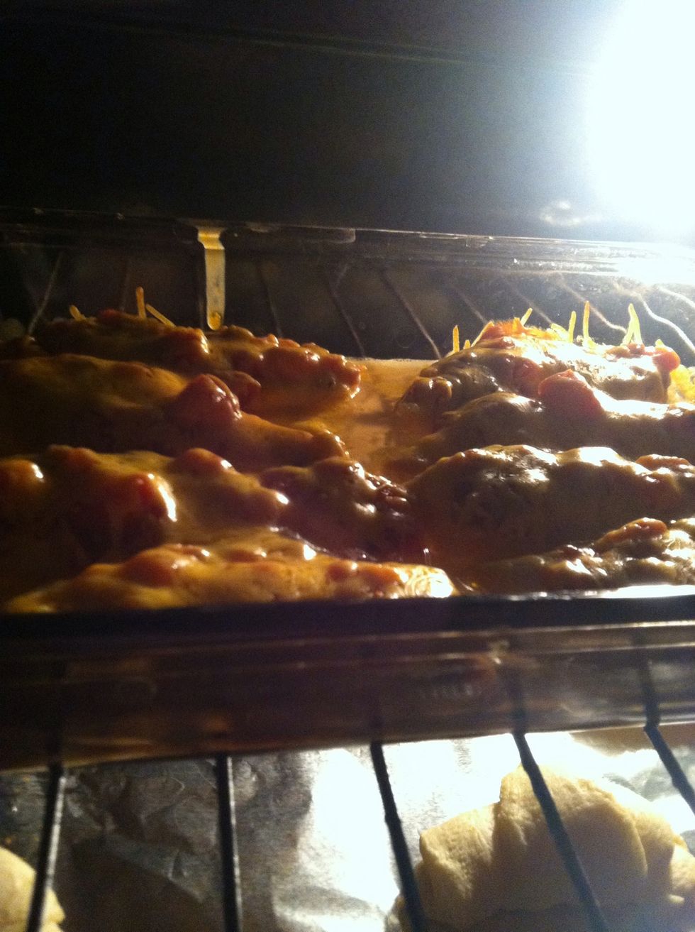 When the 30 minutes is done, take off the foil and bake for 5 more minutes. I'm also baking crescent rolls in the background :)