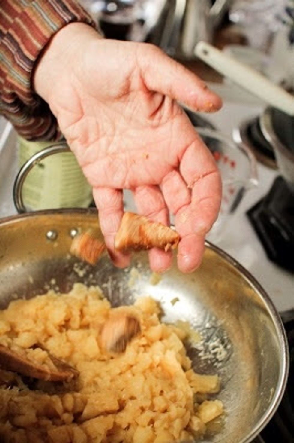 When the apples have cooked down add in the sugar. Mix until it's completely dissolved.
