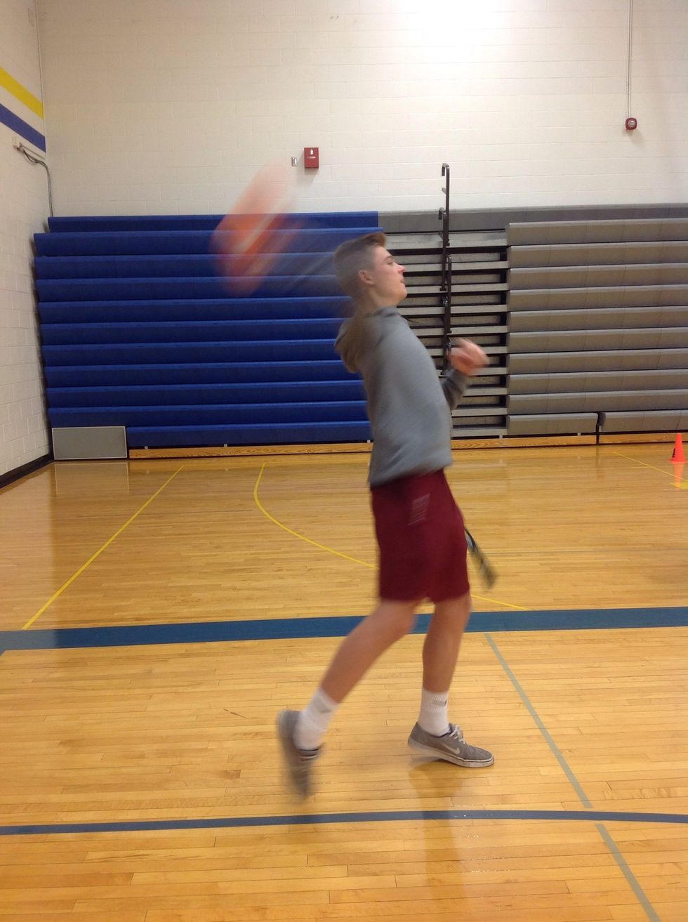 When the ball is half way twist your wrist slightly and let go as your arm is going toward your target