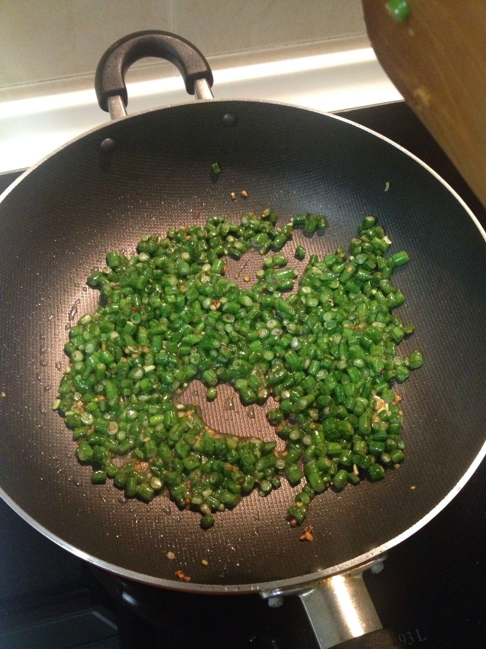 When the beans are almost cooked..