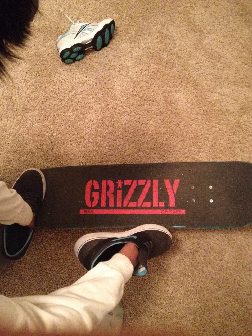 When the board is about 45 degrees, flick the board with your front foot. It should flip like a Kickflip.