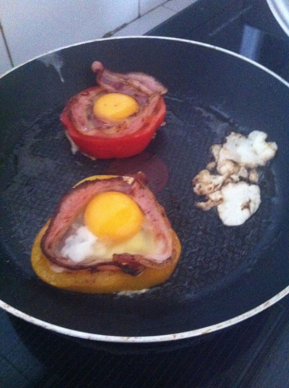 When the bottom layer is cooked, slowly trim off excess egg whites around it