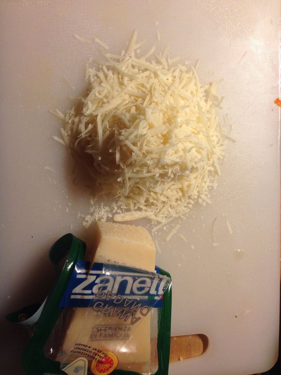 When the bread is done, put the Parmesan on the bread at put it back in the oven. When the cheese is done pour the soup in a bowl and place the cheese bread on top.