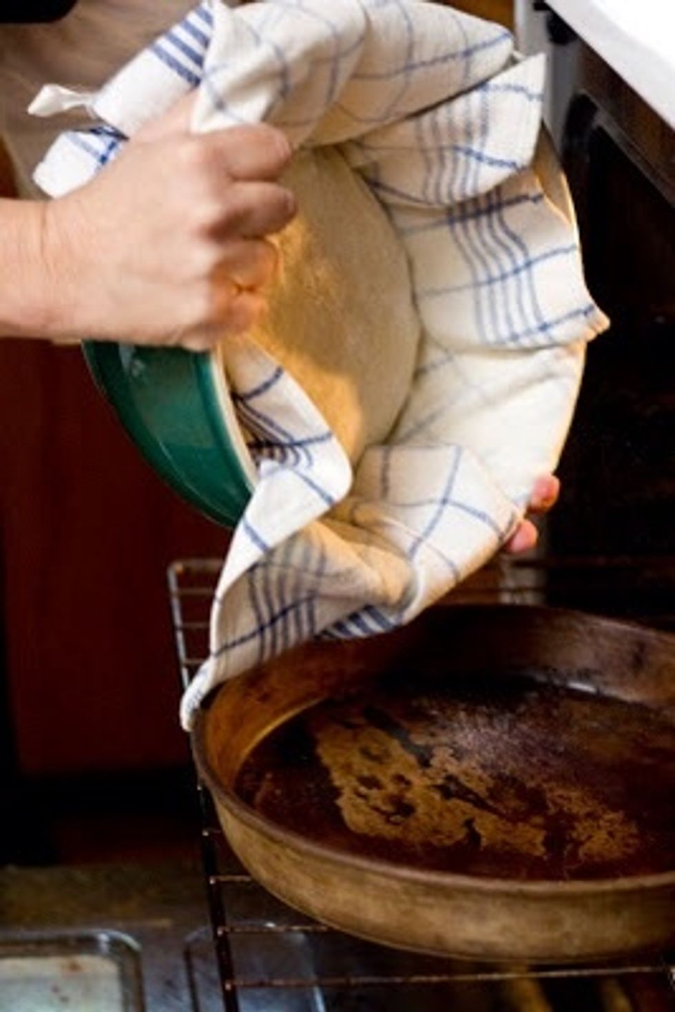 When the bread is ready to go into the oven, take the lid off the la Cloche and dump the dough into the bottom half. Or dump it onto the hot pizza stone if that's what you're using