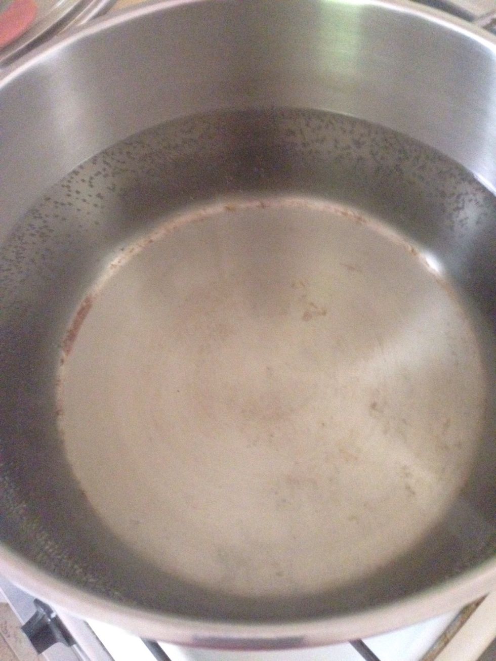When the bubbles appear and sugar completely dissolved it's time to add the fruit