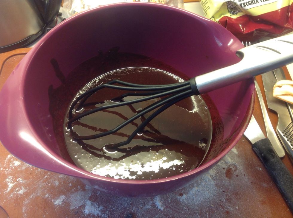 When the butter and chocolate is cooled off a little, put it in a Bowl.