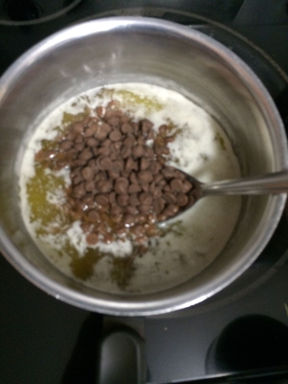 When the butter has melted add in the chocolate chips and the brown sugar
