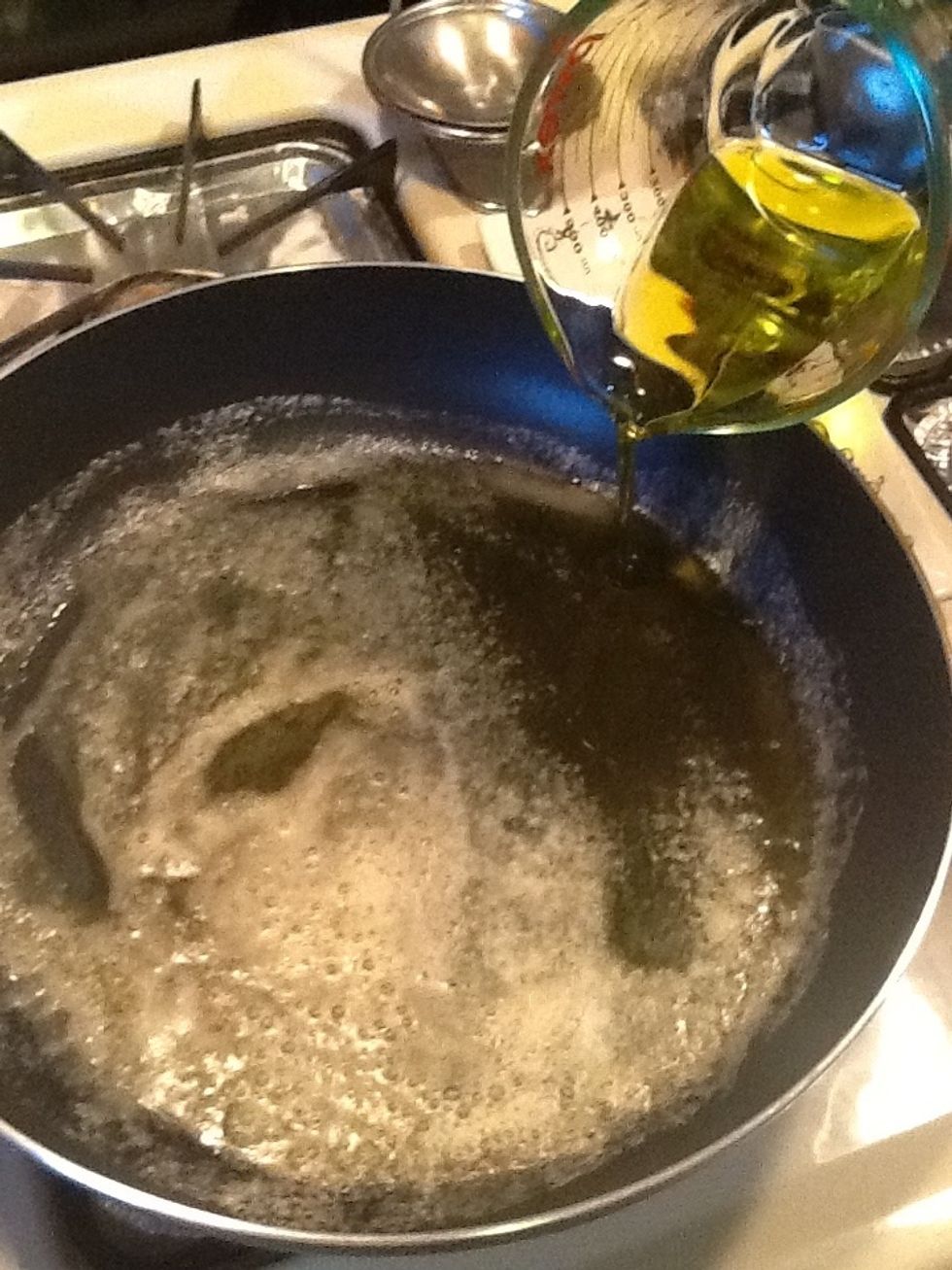 When the butter has melted add the olive oil.
