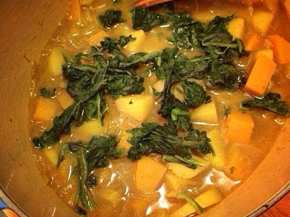 When the butternut squash is soft enough pull away the pan from the heat. Add the spinach. I didn't have enough fresh spinach so I also used some frozen.