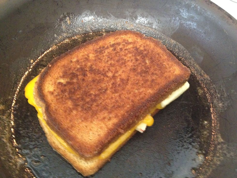 when the cheese is slightly melted, flip your sandwich carefully with the spatula. than wait until the cheese is fully melted and the bread moderately toasted to pull the sandwich from the pan.