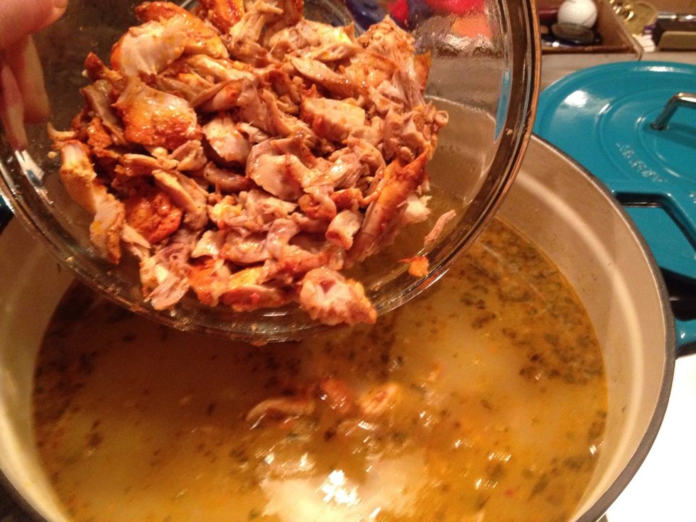 When the chicken comes of the bone easily, separate the mean from the skin and cut into bite-sized pieces. Add the meat and some of the drippings from the slow cooker to the broth and vegetables.
