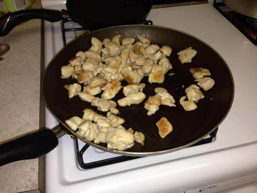 When the chicken has a nice light brown color, go ahead and take it off the stove.
