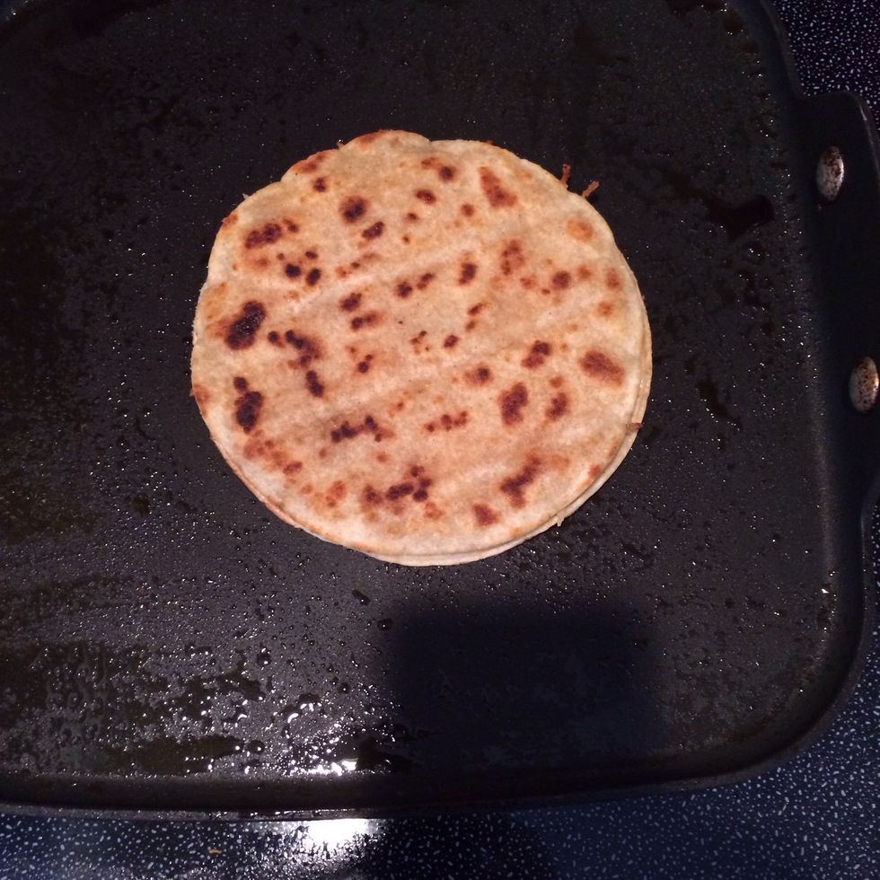 When the cooking side shrinks to the same size then IT IS DONE.