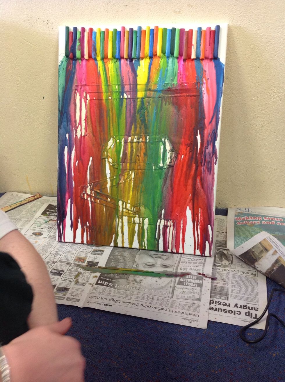 When the crayons are dry you can start peeling of the masking tape